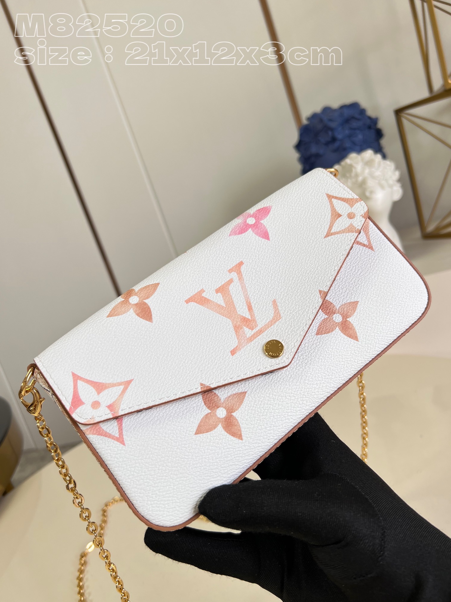 From the current holiday collection, the Louis Vuitton M82520 Pochette Félicie chain bag