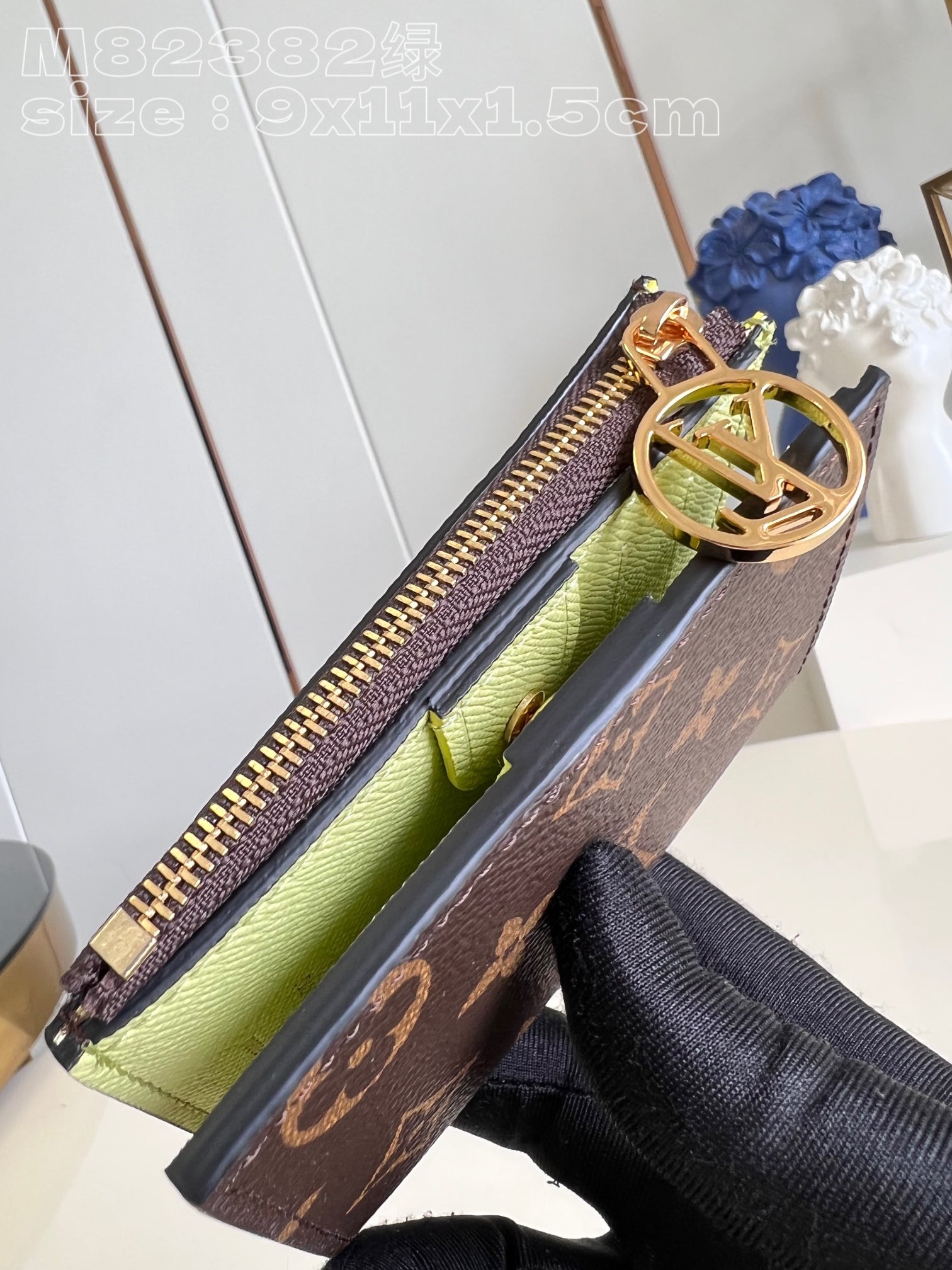 Louis Vuitton M82382 Green Portefeuille Lisa is made of Monogram canvas and lined