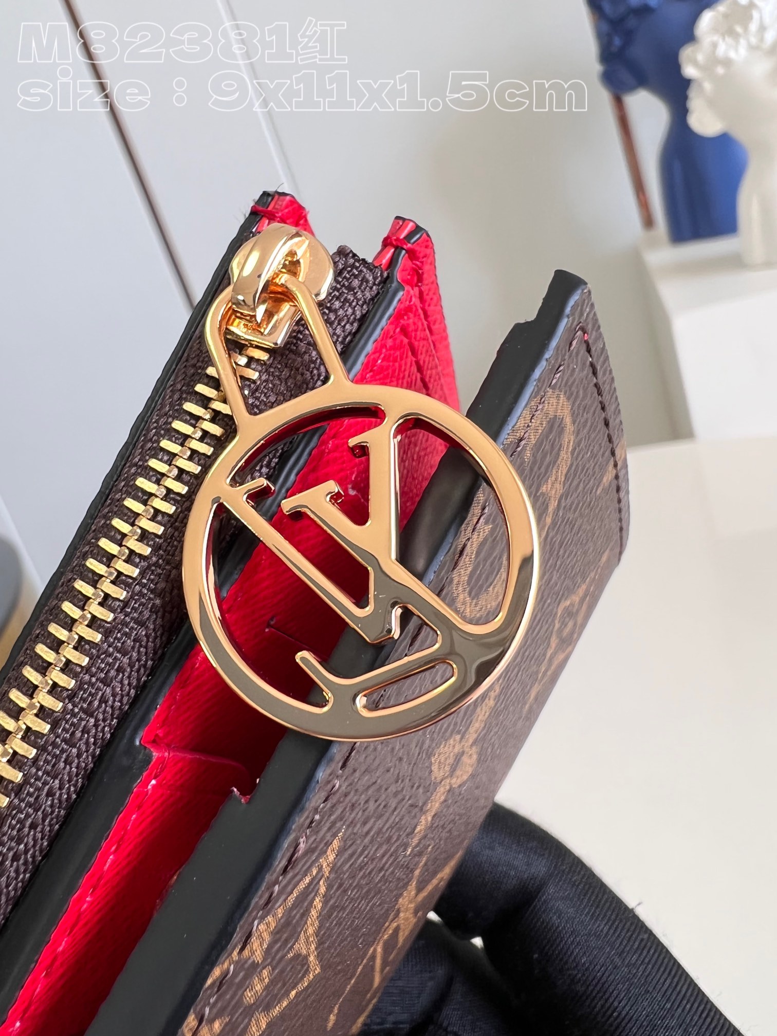 Louis Vuitton M82381 Red Portefeuille Lisa is made of Monogram canvas and lined with colored