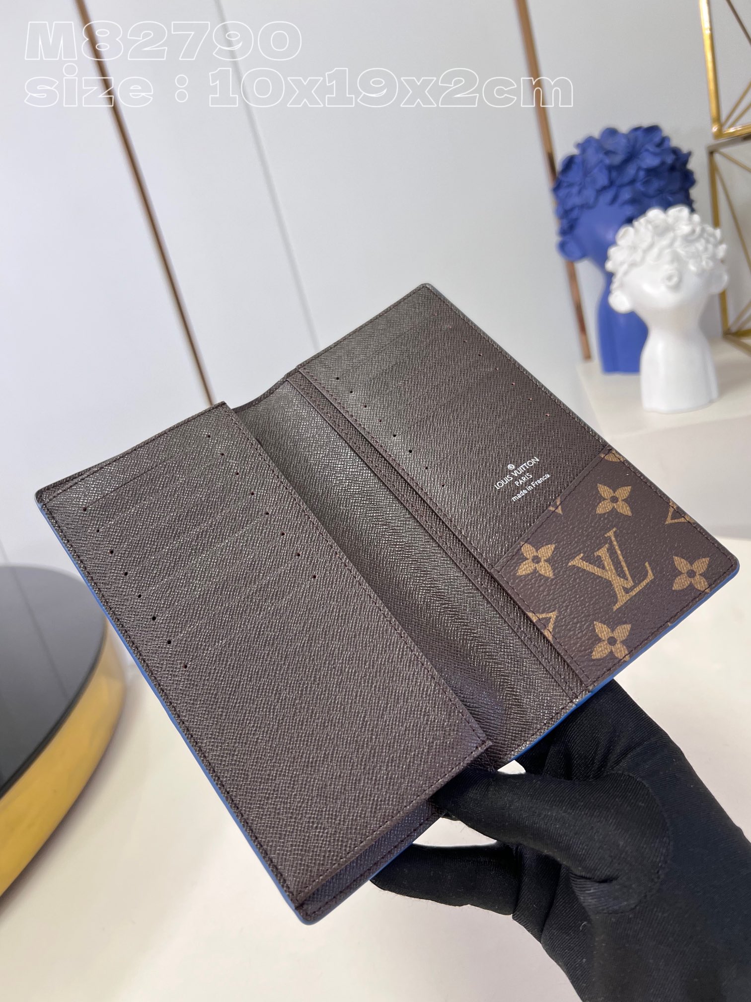 Louis Vuitton M82790 Blue Brazza wallet in Monogram-coated canvas with a color-blocked interior