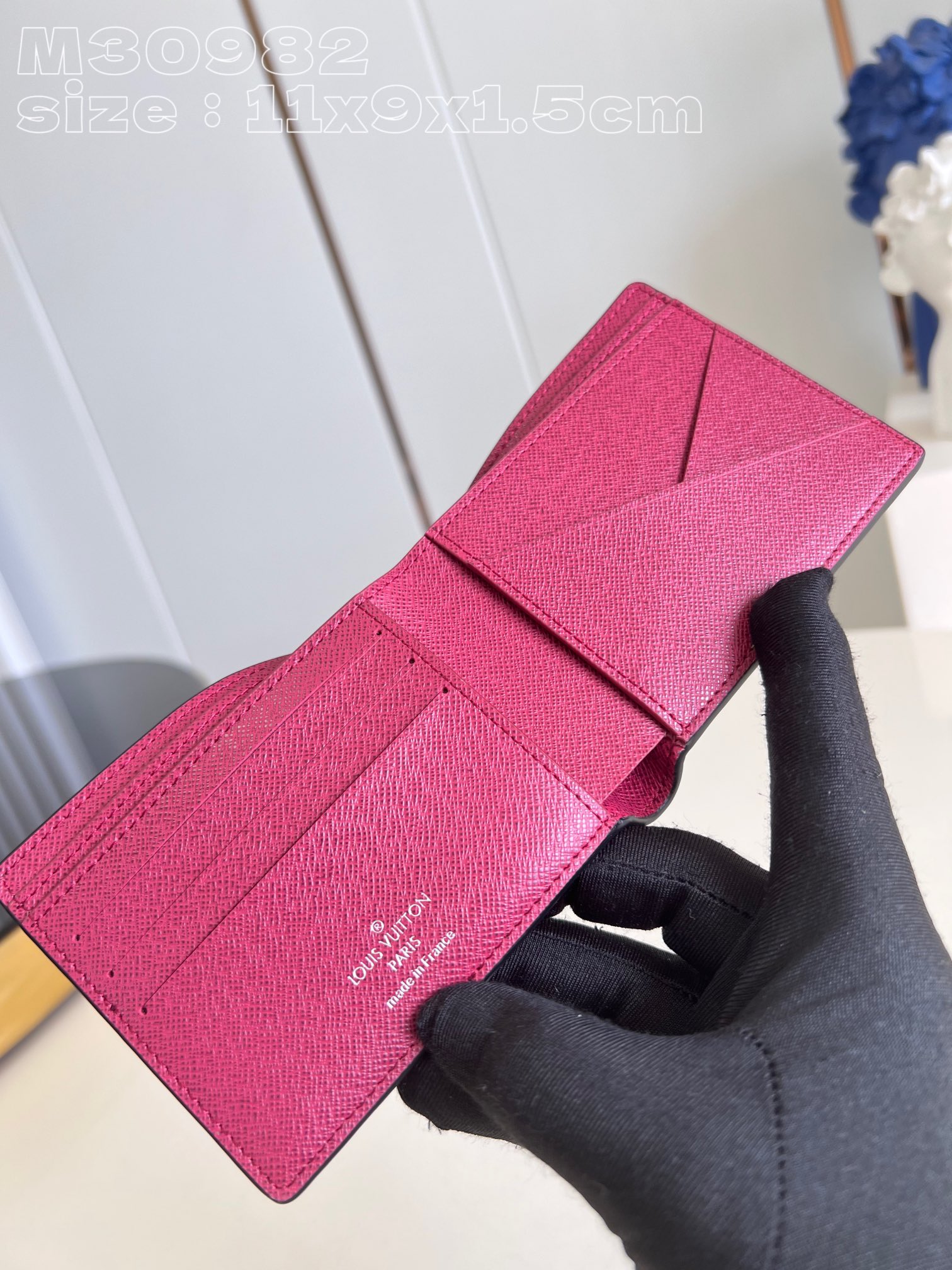 Louis Vuitton M30982 Date Multiple wallet in Taga cowhide leather is a minimalist design