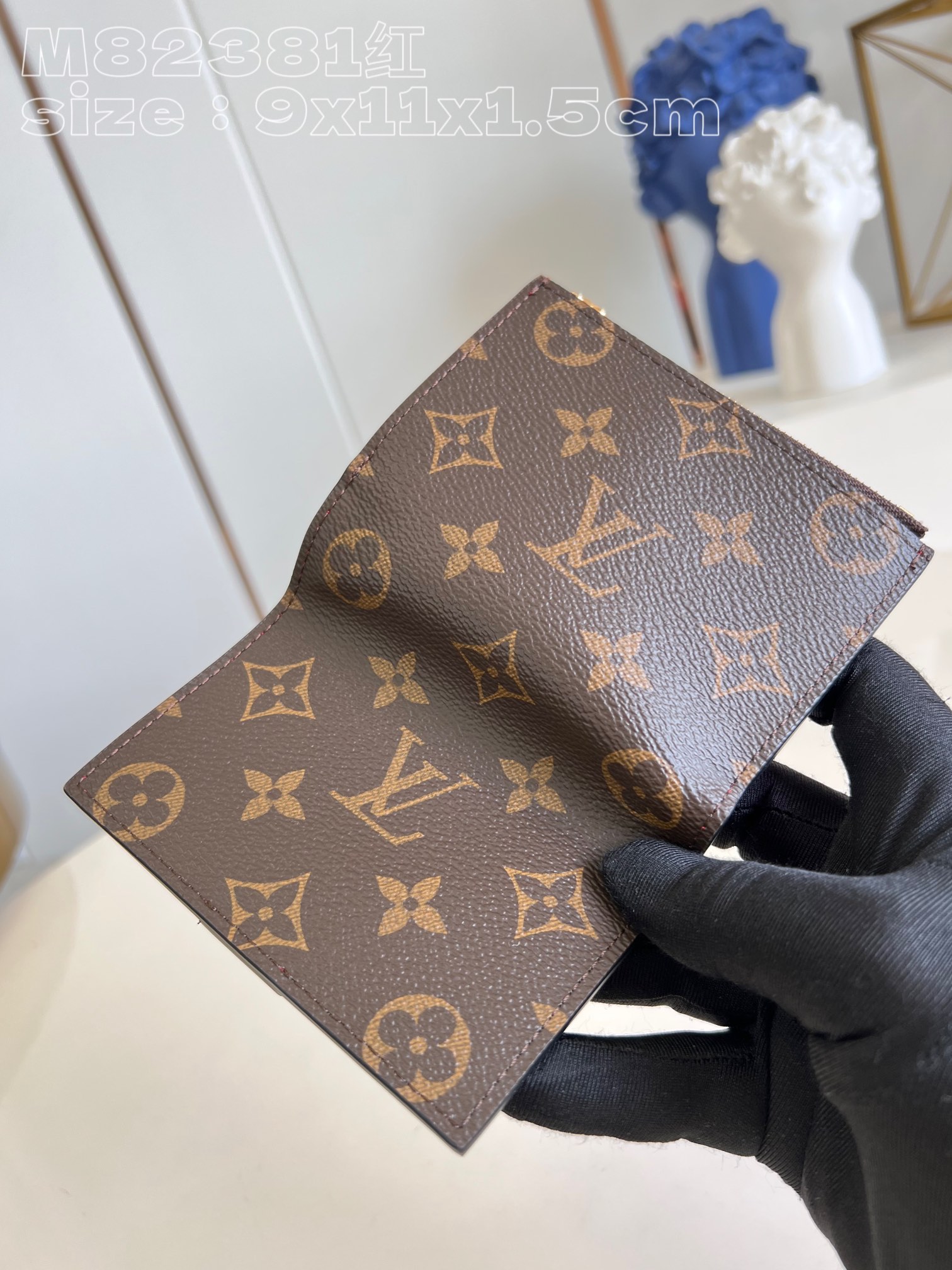 Louis Vuitton M82381 Red Portefeuille Lisa is made of Monogram canvas and lined with colored