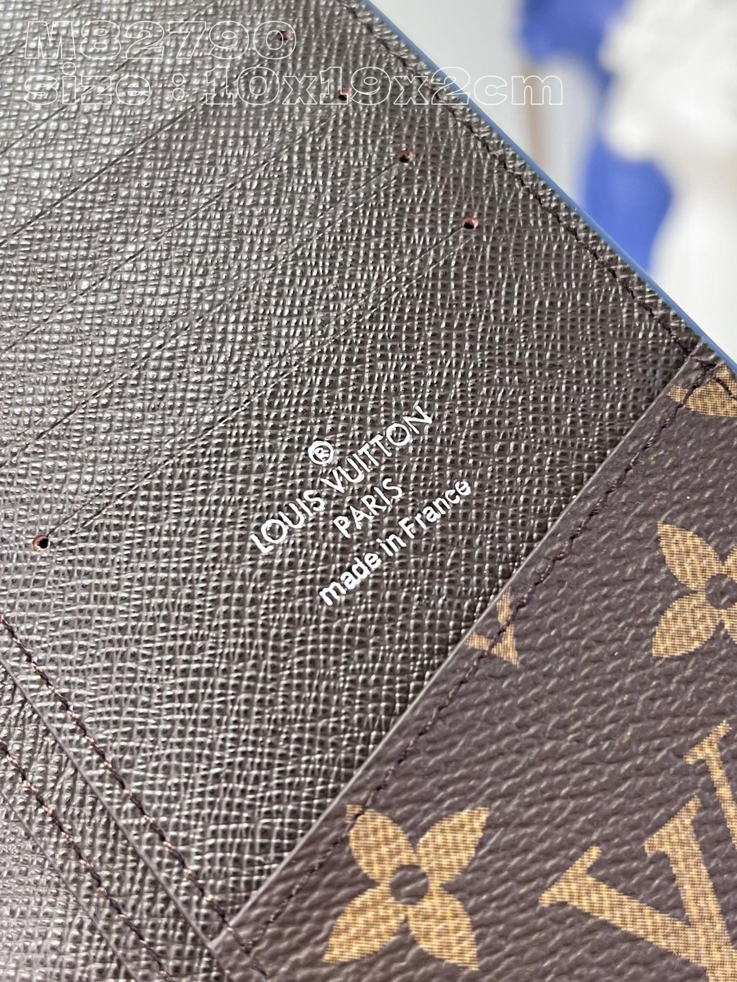 Louis Vuitton M82790 Blue Brazza wallet in Monogram-coated canvas with a color-blocked interior