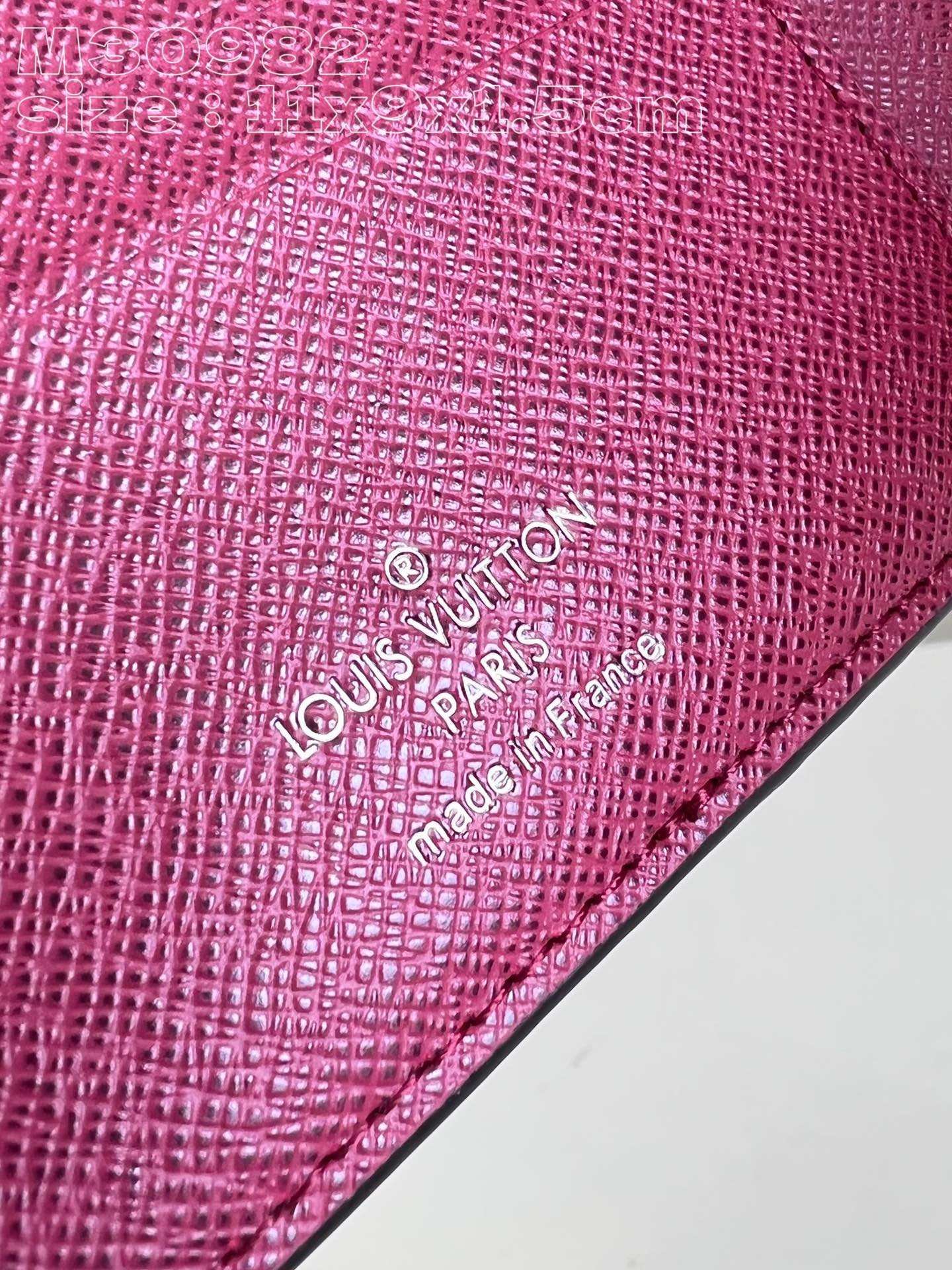 Louis Vuitton M30982 Date Multiple wallet in Taga cowhide leather is a minimalist design