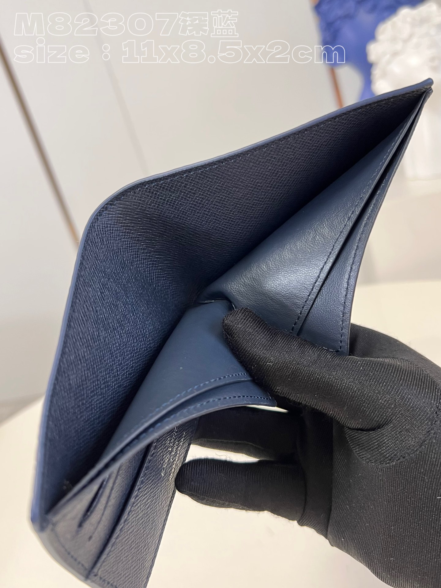 Louis Vuitton M82307 Slender bag in dark blue is crafted in crisp Monogram Aquagarden canvas