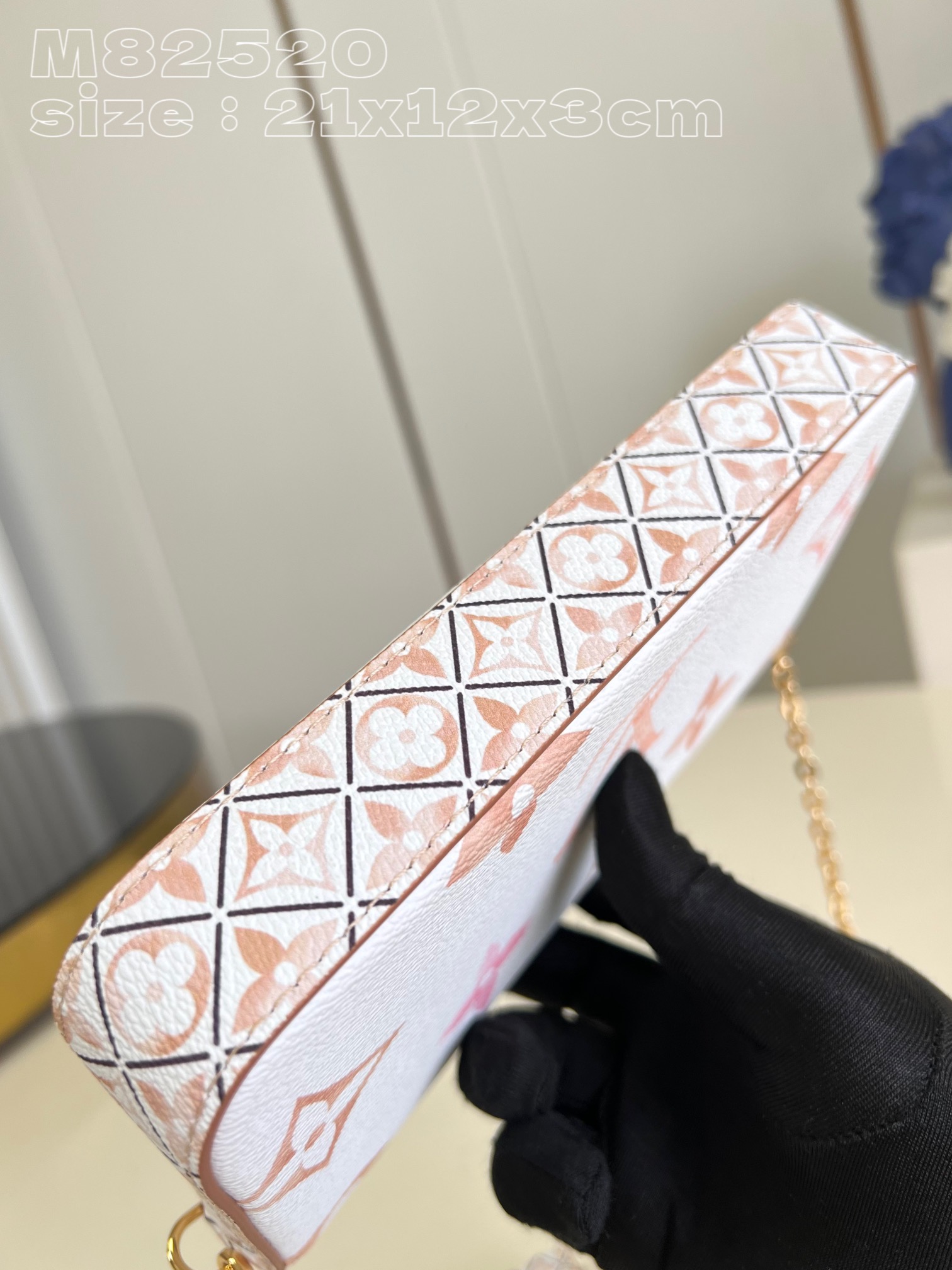 From the current holiday collection, the Louis Vuitton M82520 Pochette Félicie chain bag