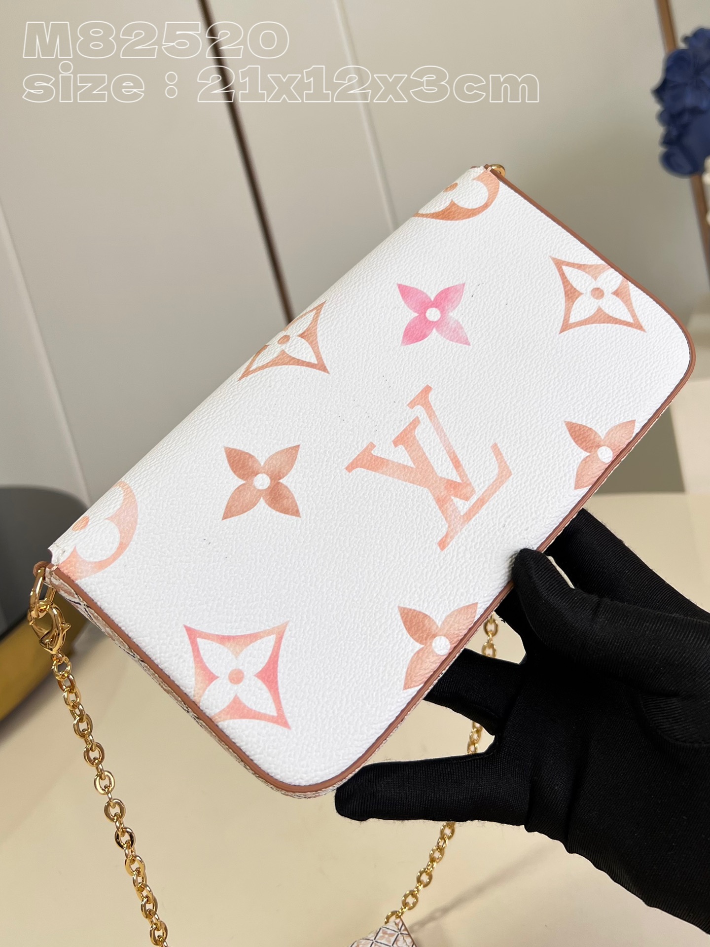 From the current holiday collection, the Louis Vuitton M82520 Pochette Félicie chain bag