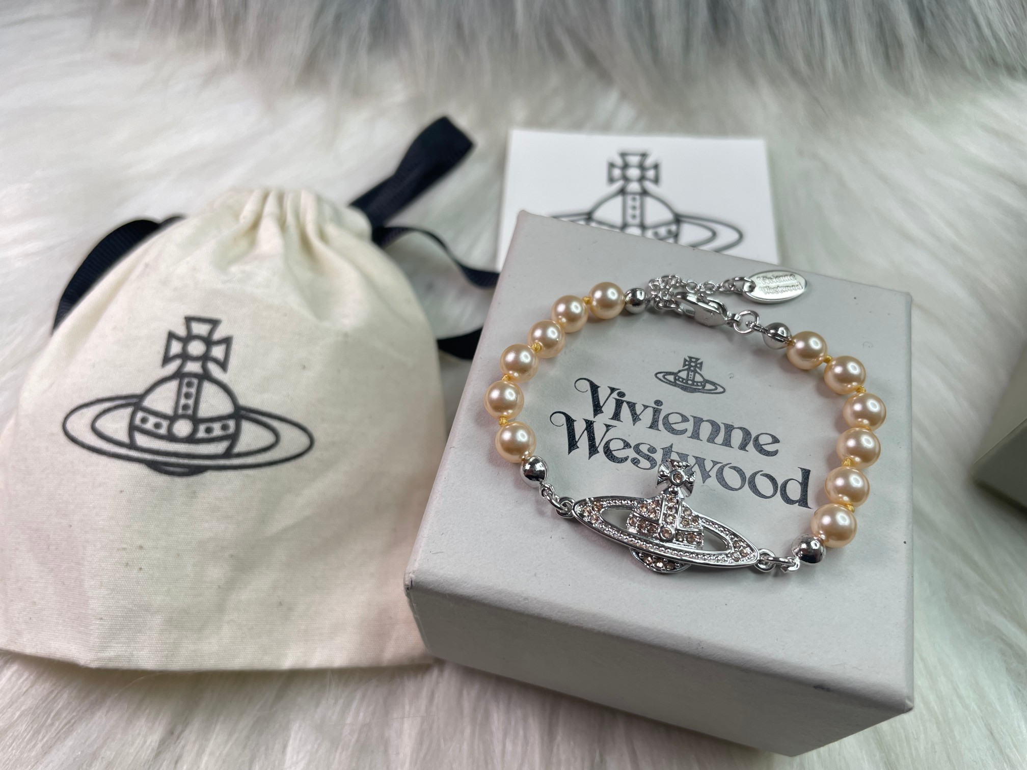 Saturn Pearl Bracelet