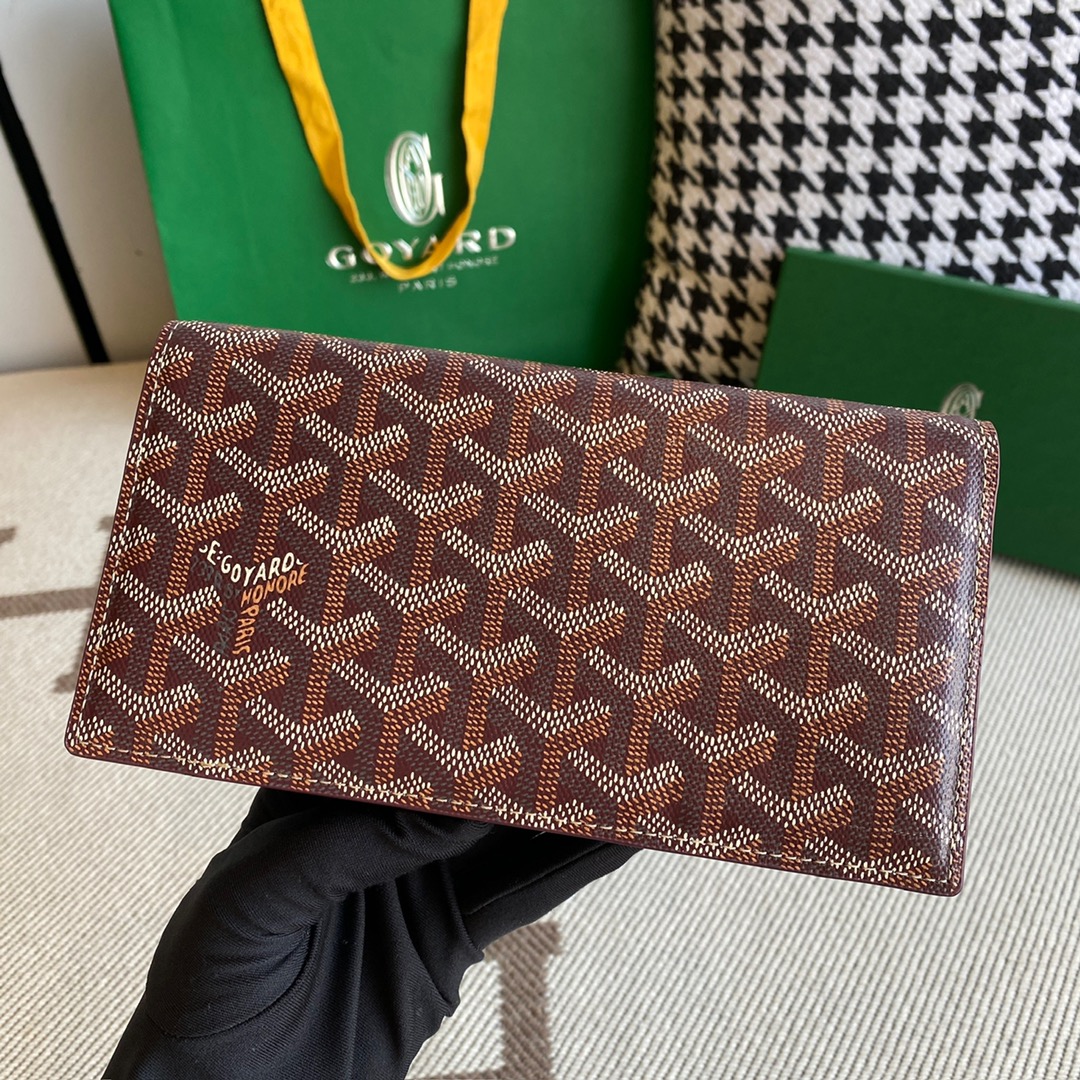 burgundy goyard Richelieu Wallet a long wallet that fastens with a snap fastener