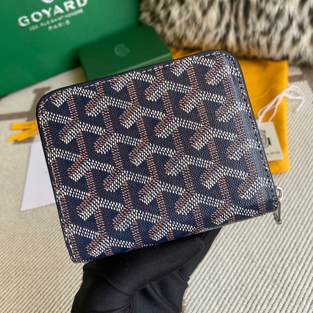 Navy Goyard Matignon PM Wallet is a compact shape and closes securely with a zip