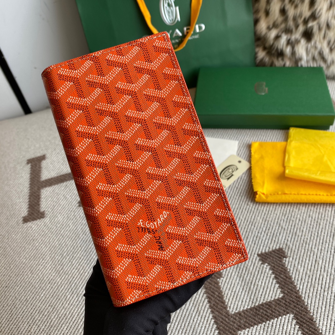 Orange Goyard Saint-Lambert Wallet is a universal phone case with all the everyday essentials in one