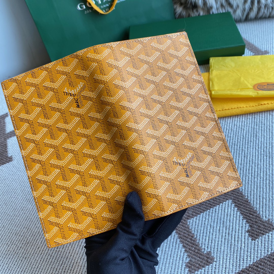 Yellow Goyard Saint-Lambert Wallet is a universal phone case with all the everyday essentials in one