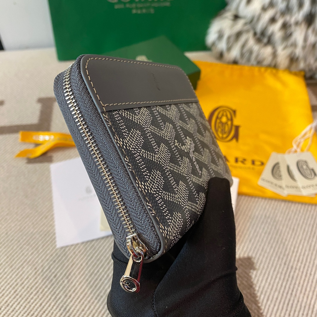 grey Goyard Matignon PM Wallet is a compact shape and closes securely with a zip