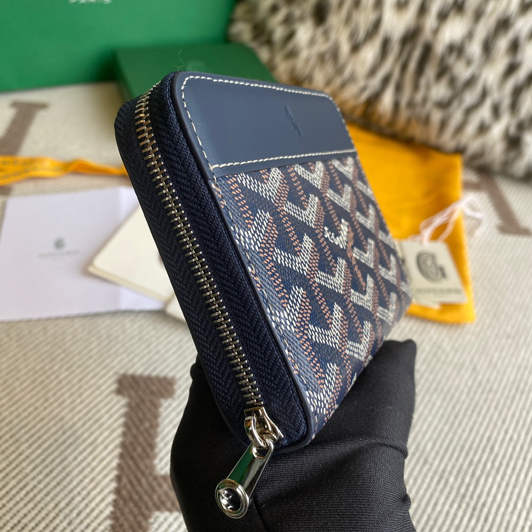 Navy Goyard Matignon PM Wallet is a compact shape and closes securely with a zip