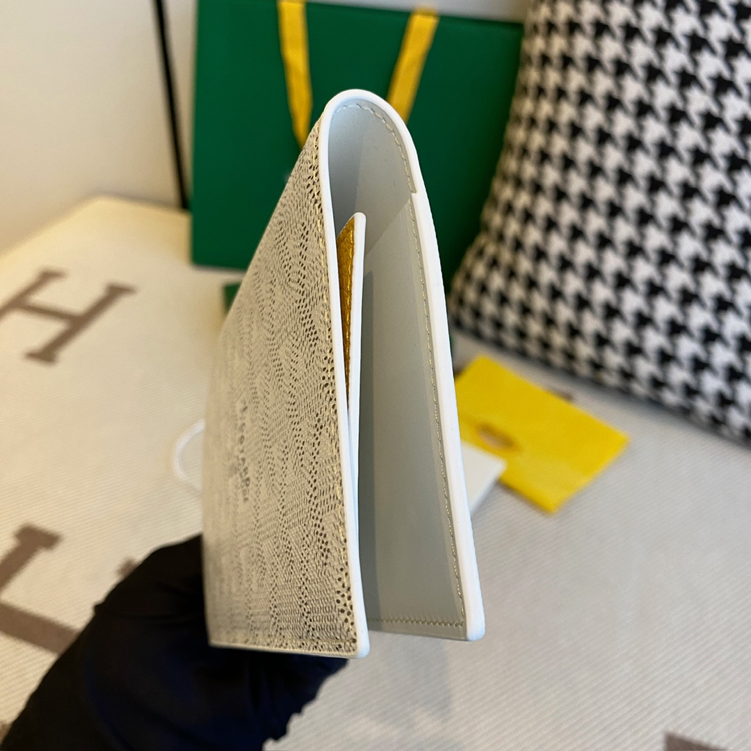 White goyard Grenelle Passport Cover is ideal for travelling