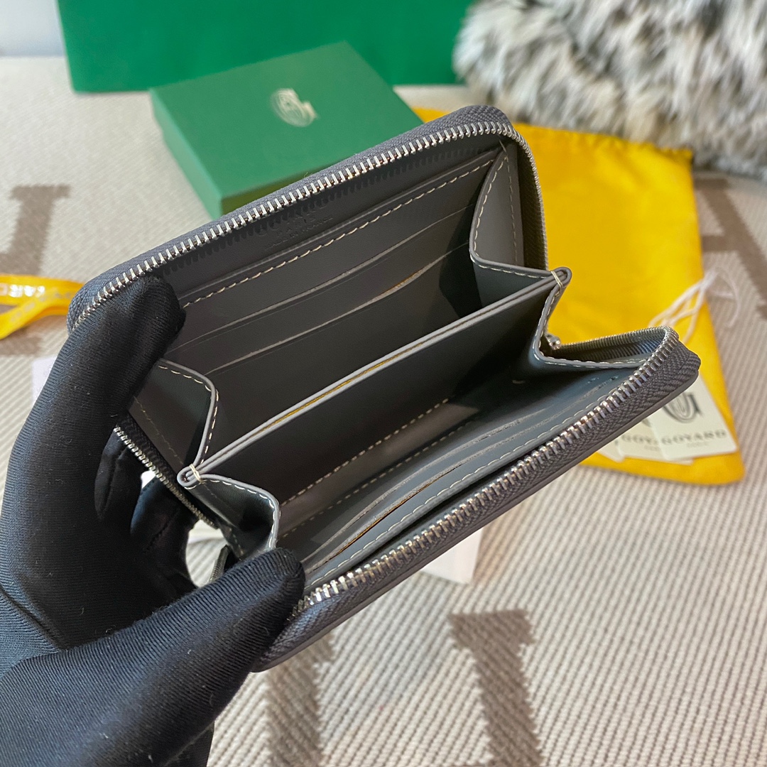 grey Goyard Matignon PM Wallet is a compact shape and closes securely with a zip