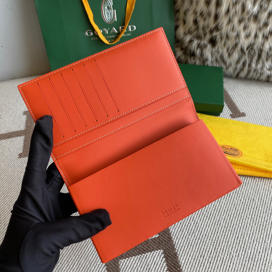 Orange Goyard Saint-Lambert Wallet is a universal phone case with all the everyday essentials in one