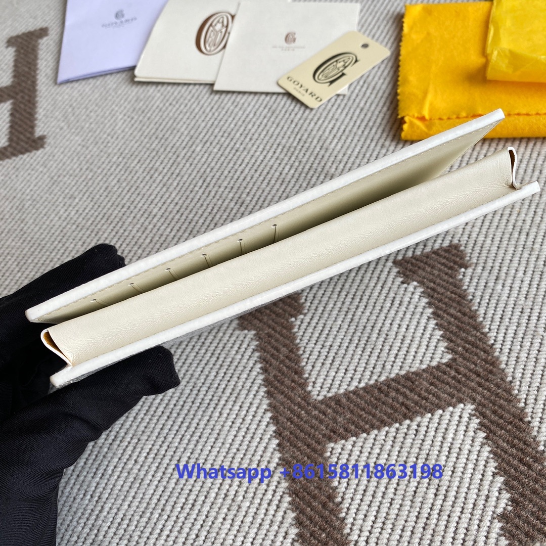 White Goyard Saint-Lambert Wallet is a universal phone case with all the everyday essentials in one