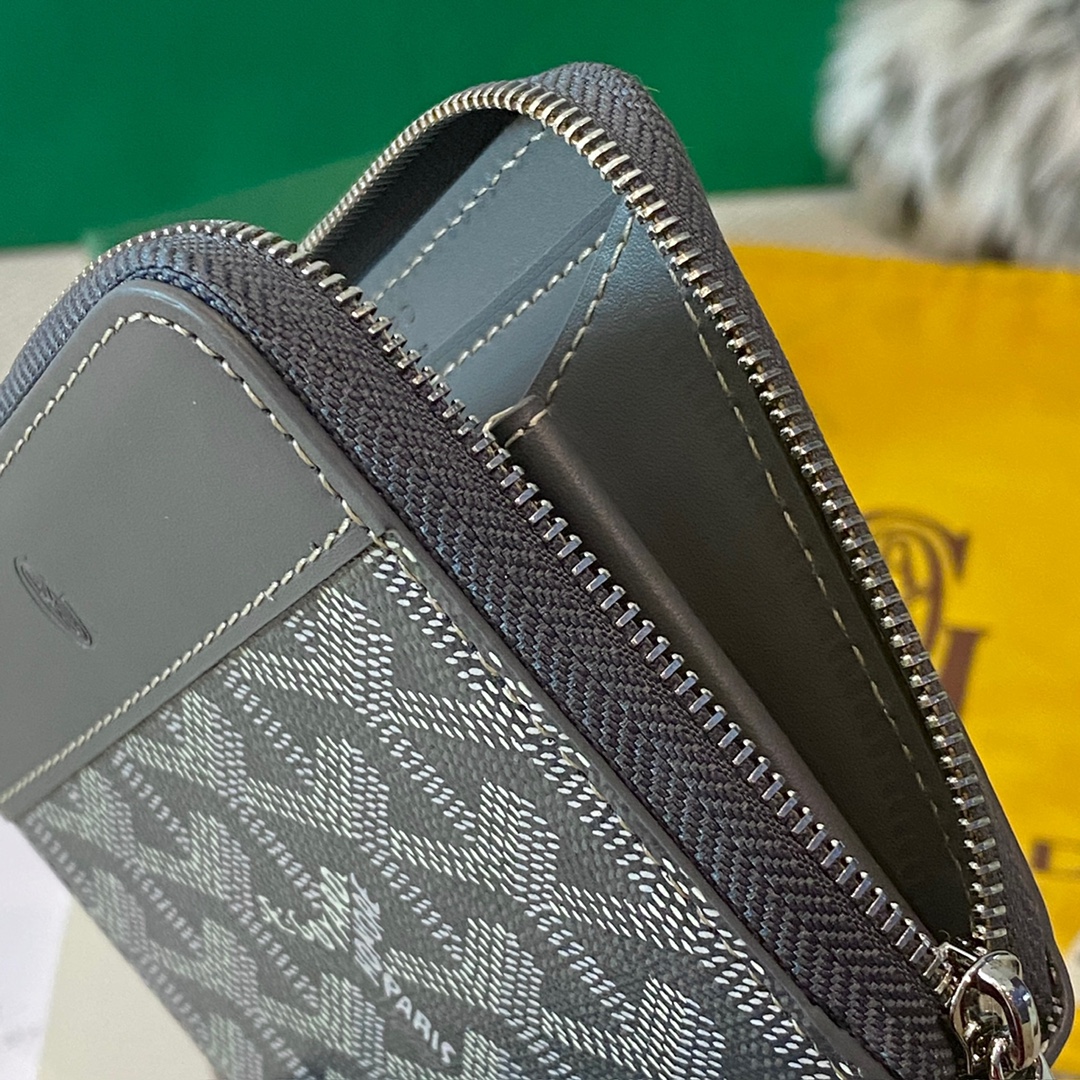 grey Goyard Matignon PM Wallet is a compact shape and closes securely with a zip