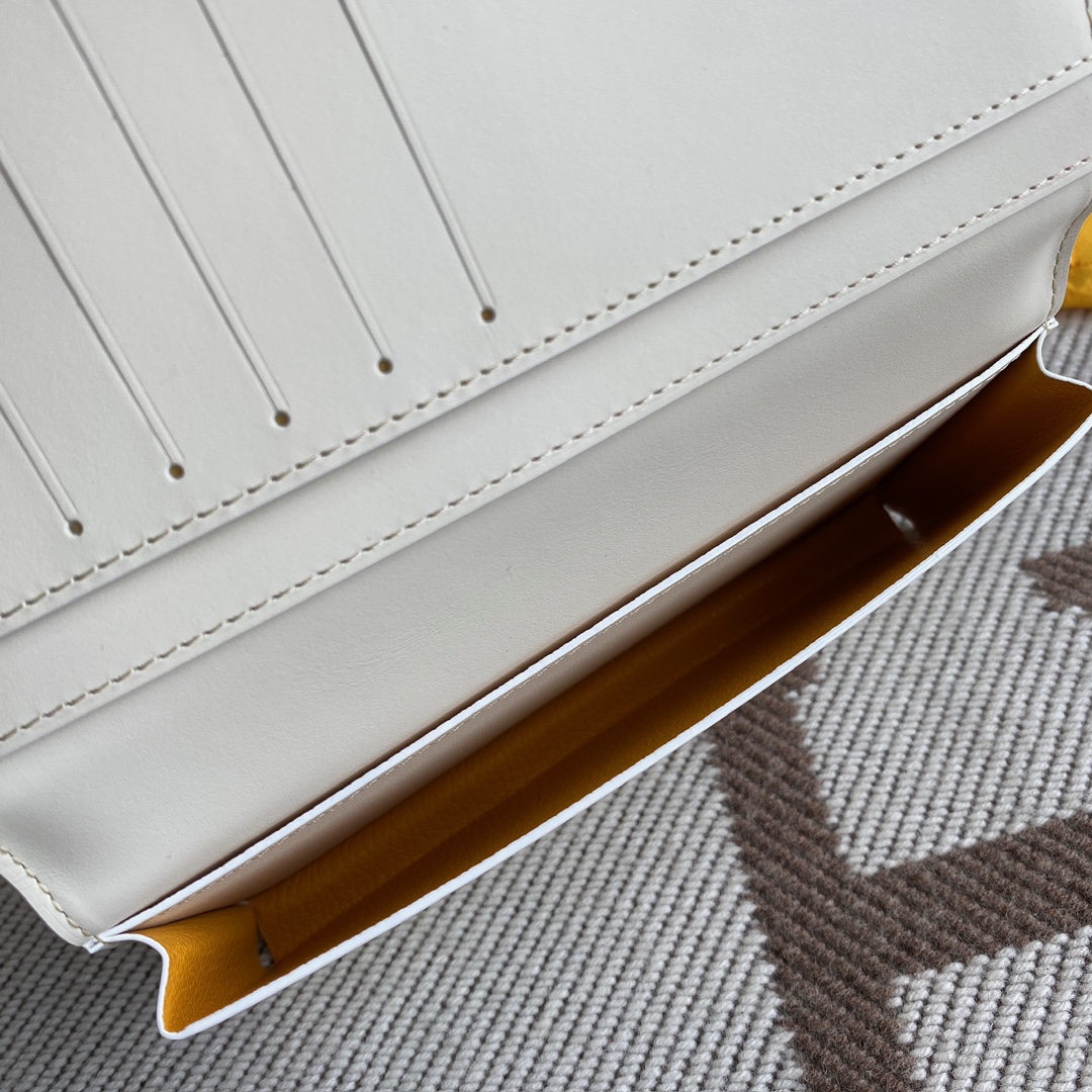 White Goyard Saint-Lambert Wallet is a universal phone case with all the everyday essentials in one