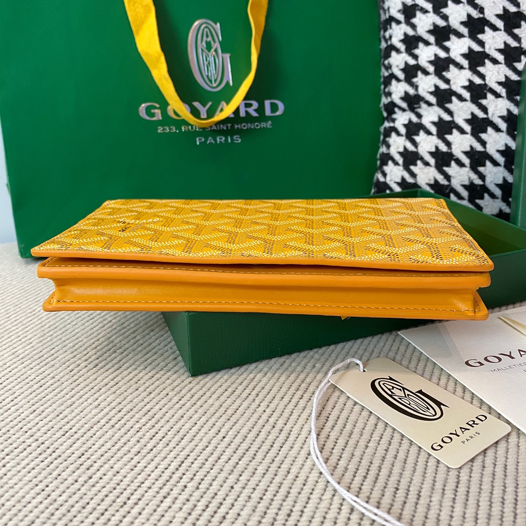 yellow goyard Richelieu Wallet a long wallet that fastens with a snap fastener