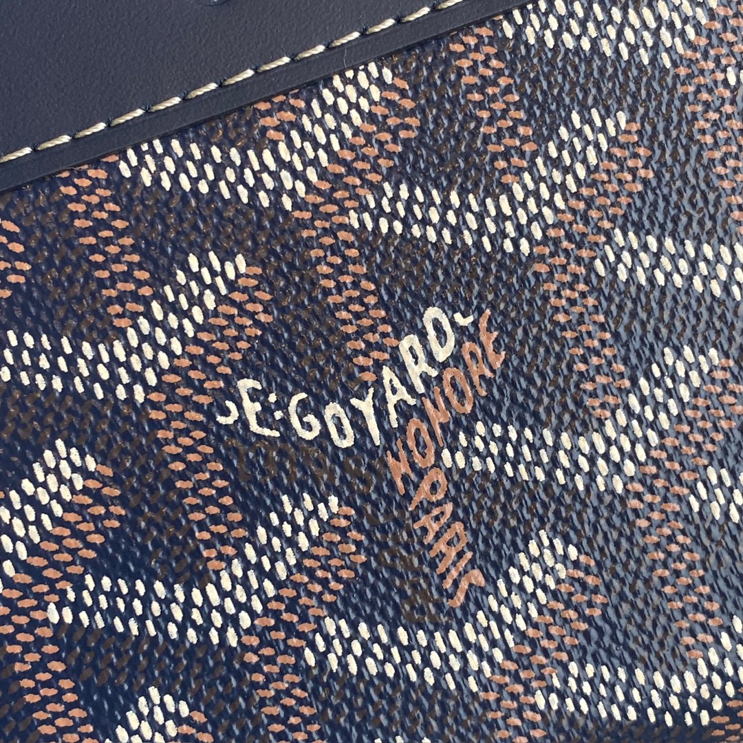 Navy Goyard Matignon PM Wallet is a compact shape and closes securely with a zip