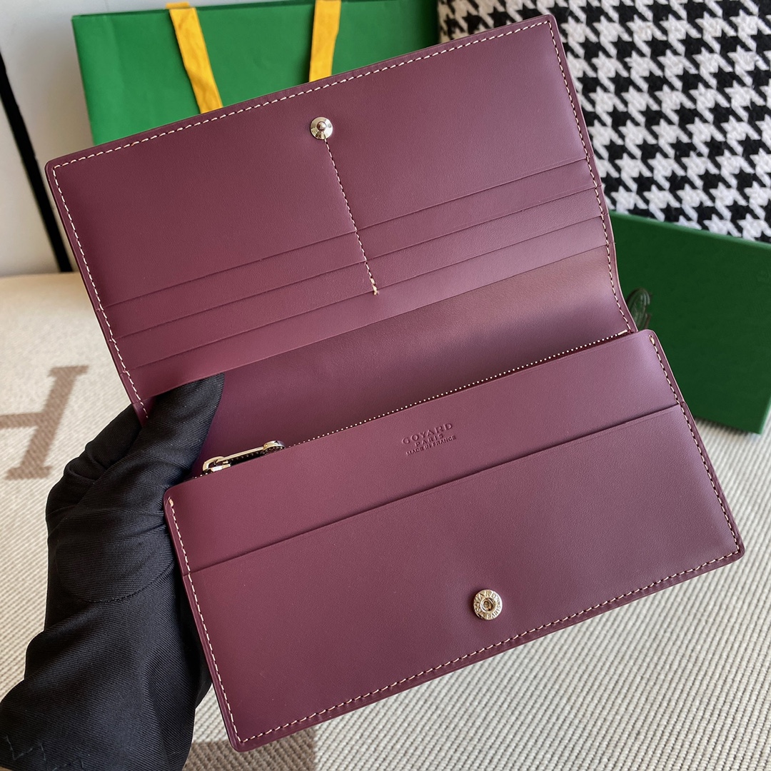 burgundy goyard Richelieu Wallet a long wallet that fastens with a snap fastener