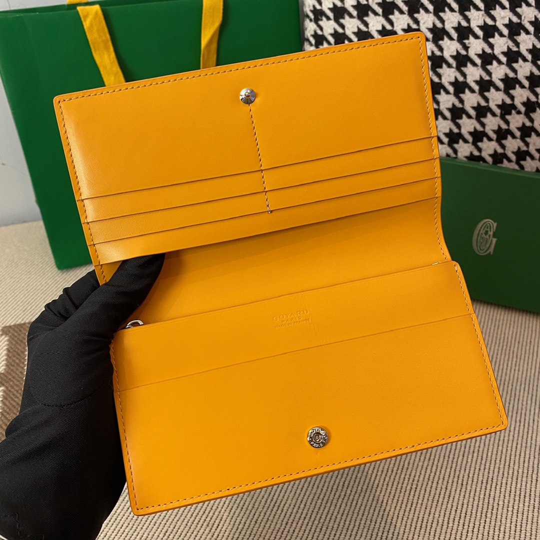 yellow goyard Richelieu Wallet a long wallet that fastens with a snap fastener