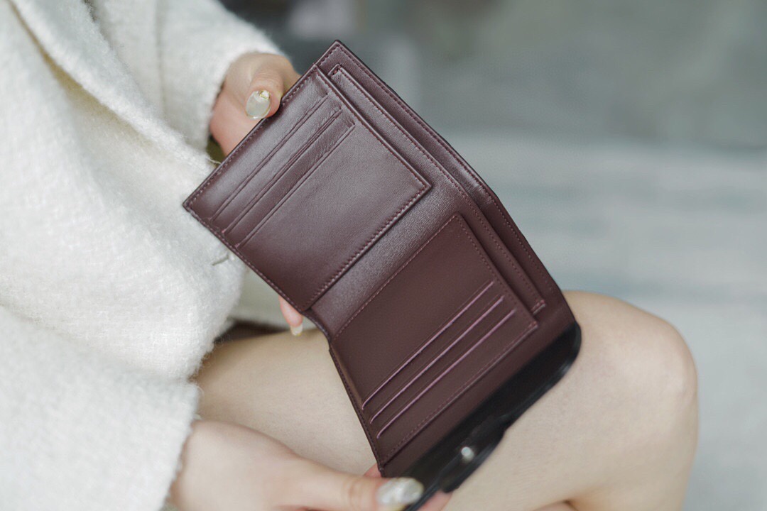 Chanel classic trifold short clip black lamb silver delicate lambskin has a kind of innate charm