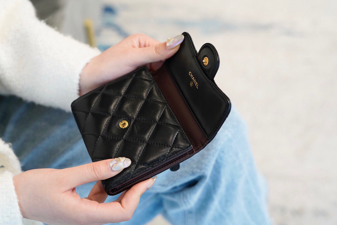 Chanel classic trifold short clip black sheep gold delicate lambskin has a kind of innate charm