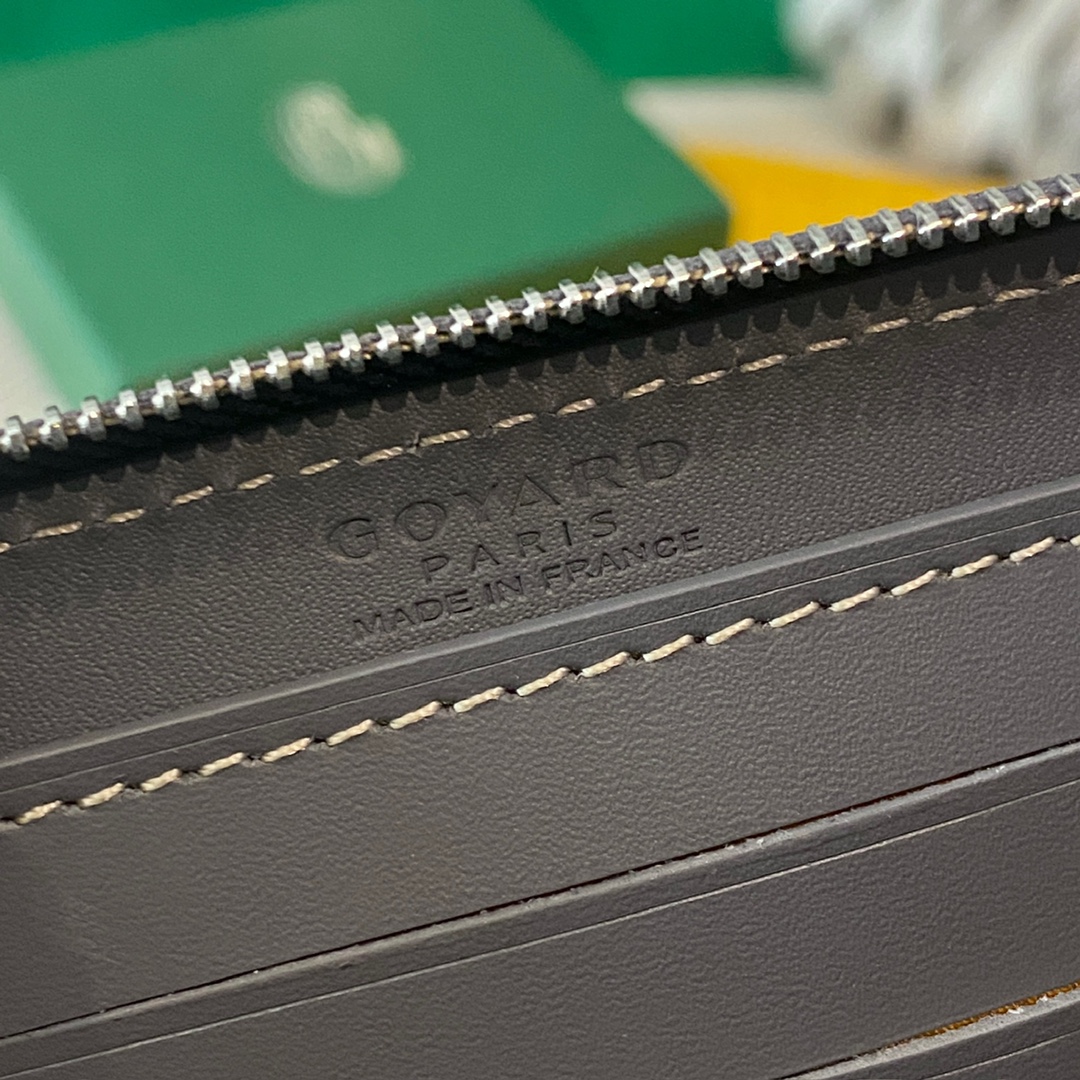 grey Goyard Matignon PM Wallet is a compact shape and closes securely with a zip