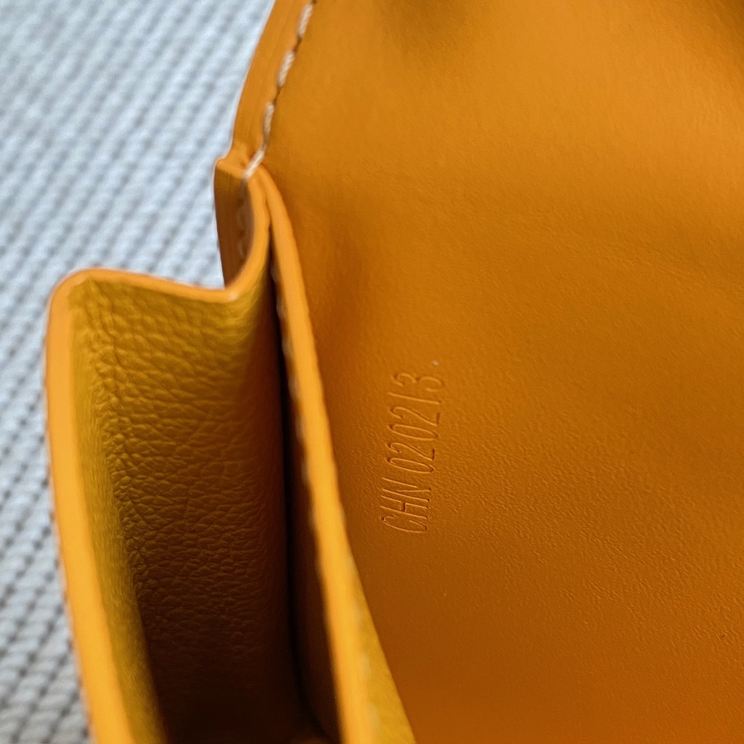 Yellow Goyard Saint-Lambert Wallet is a universal phone case with all the everyday essentials in one