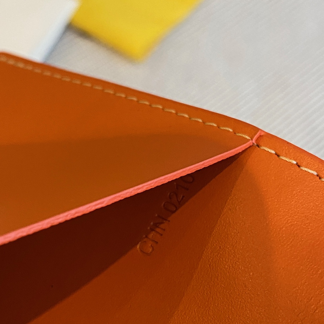 Orange goyard Grenelle Passport Cover is ideal for travelling