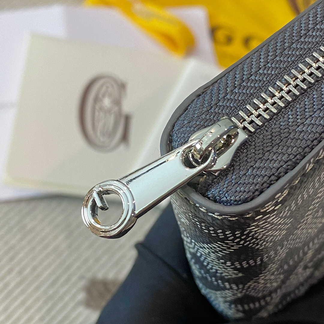 grey Goyard Matignon PM Wallet is a compact shape and closes securely with a zip