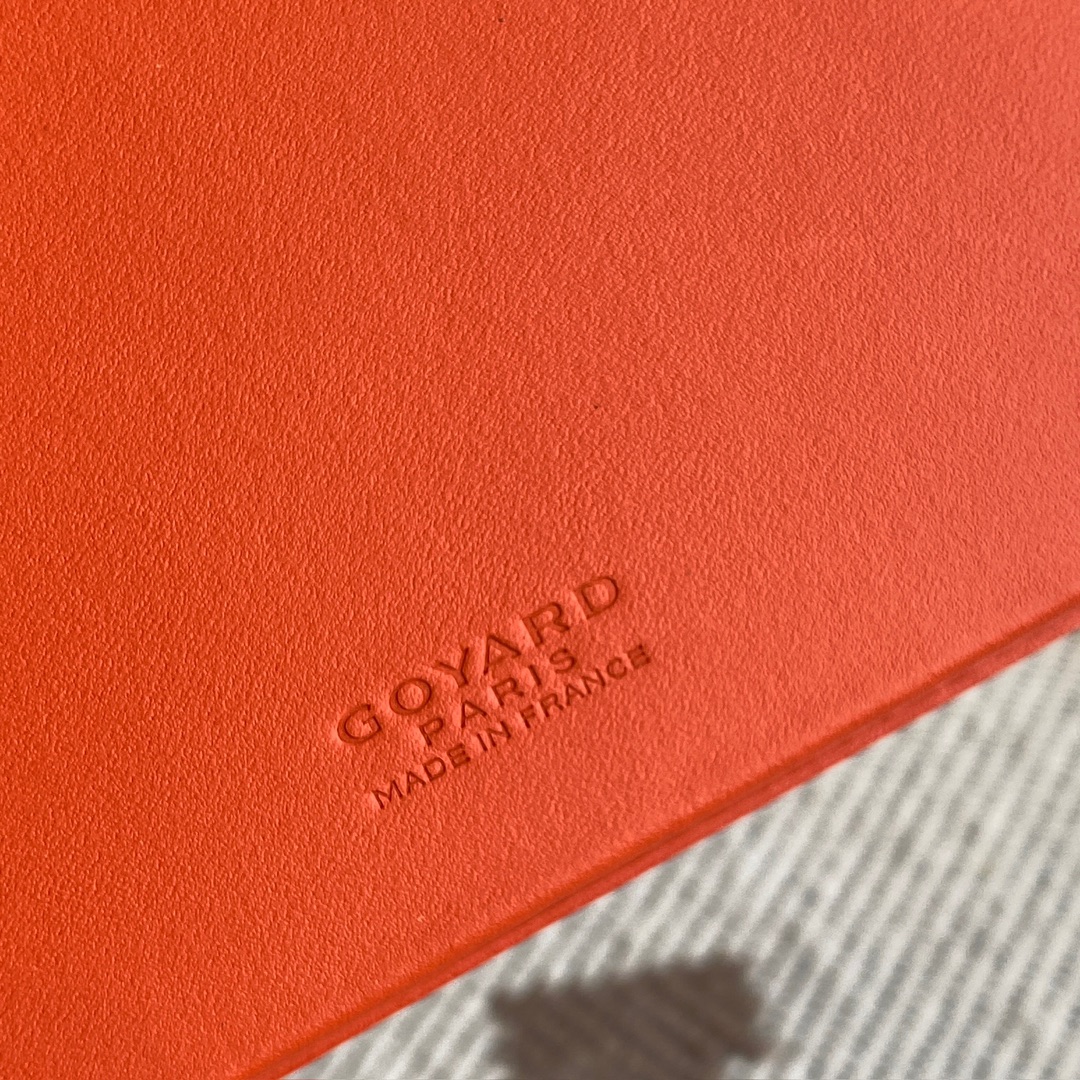 Orange Goyard Saint-Lambert Wallet is a universal phone case with all the everyday essentials in one