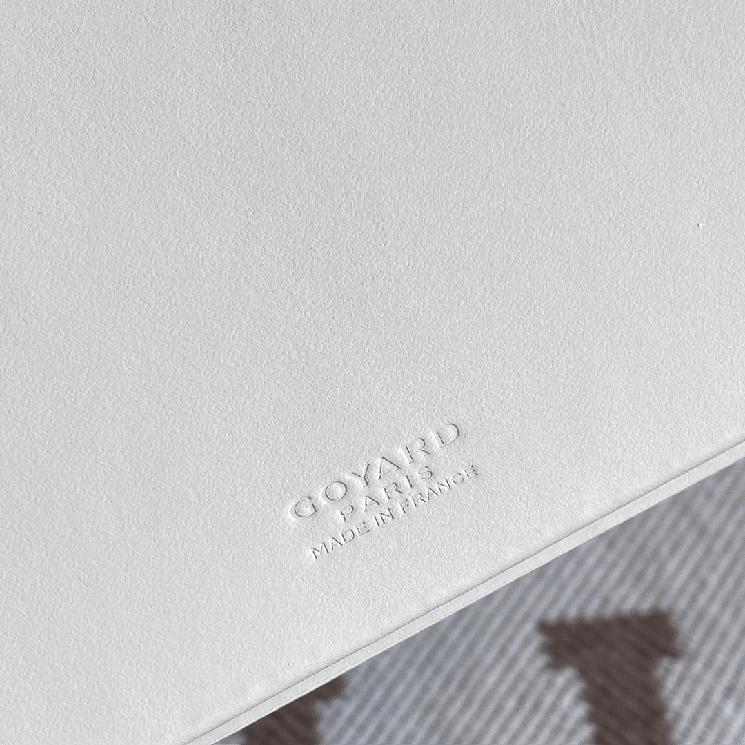 White Goyard Saint-Lambert Wallet is a universal phone case with all the everyday essentials in one