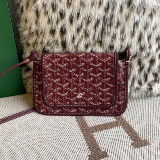 burgundy Go*ard plumet pocket wallet designed with compartments for change, notes and cards