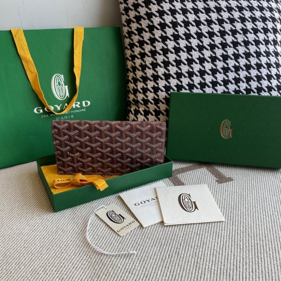 burgundy goyard Richelieu Wallet a long wallet that fastens with a snap fastener