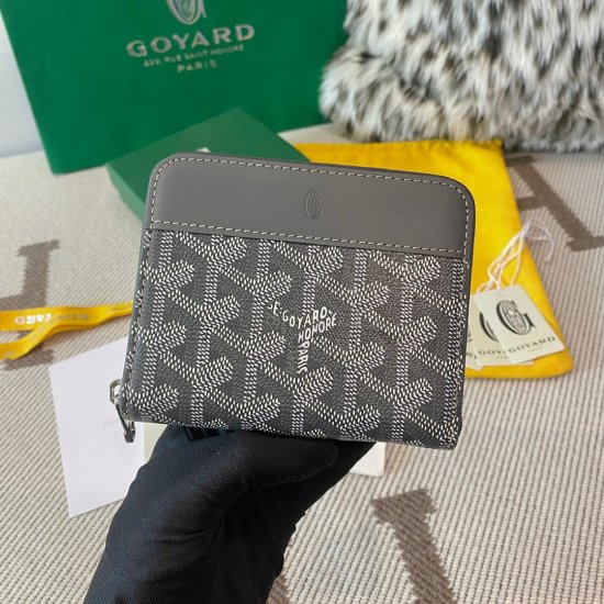 grey Goyard Matignon PM Wallet is a compact shape and closes securely with a zip