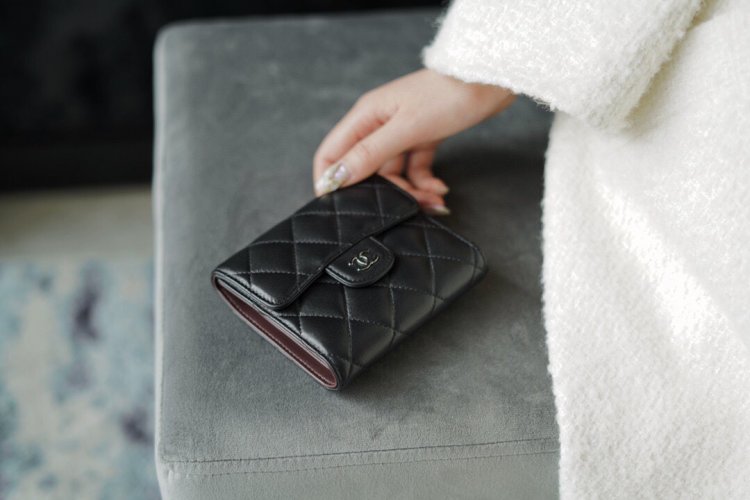 Chanel classic trifold short clip black lamb silver delicate lambskin has a kind of innate charm