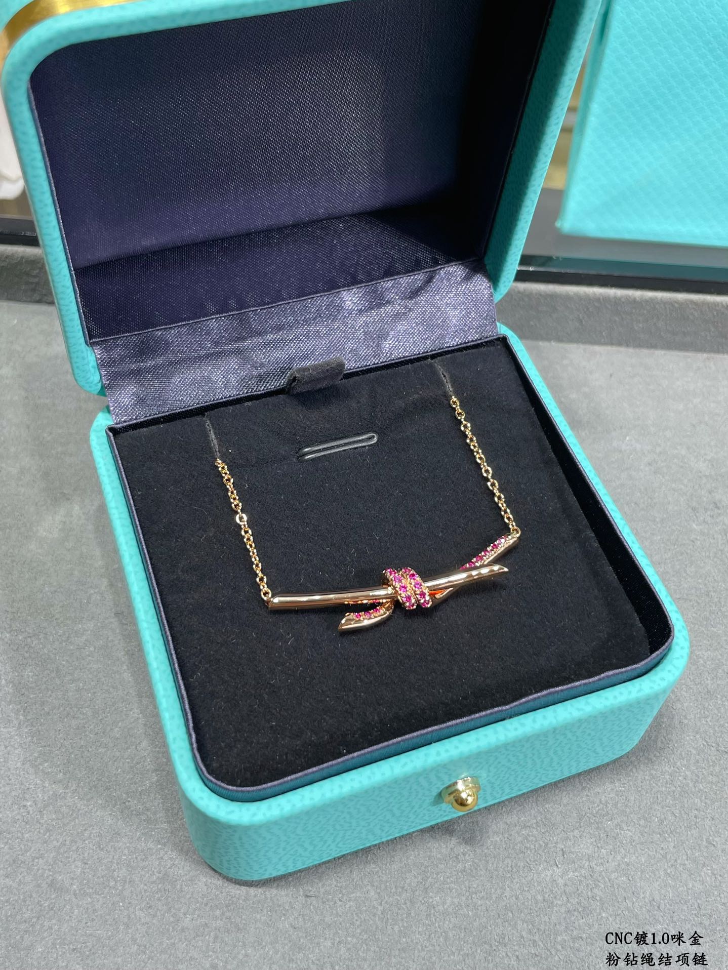 Knot Necklace with Pink Diamonds
