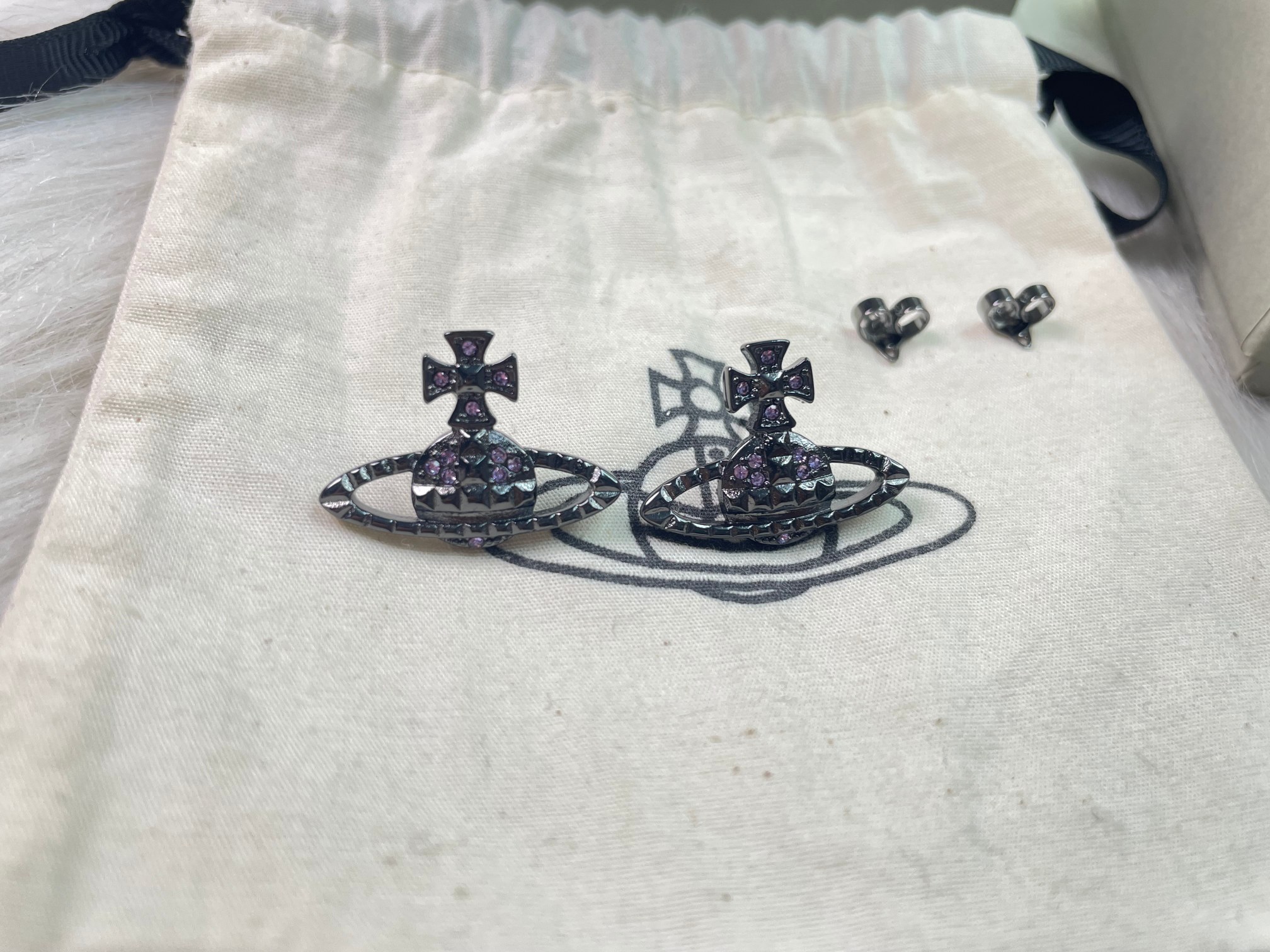 Rivet Purple Diamond Earrings